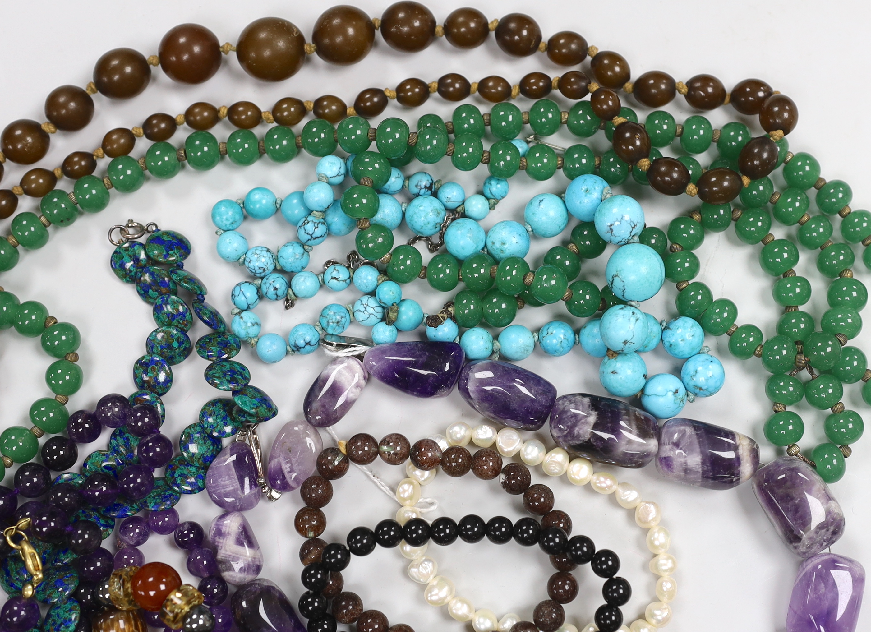 A group of assorted bead necklaces